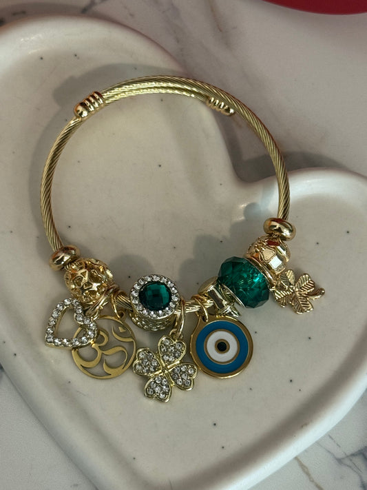 Charm bangle with omm